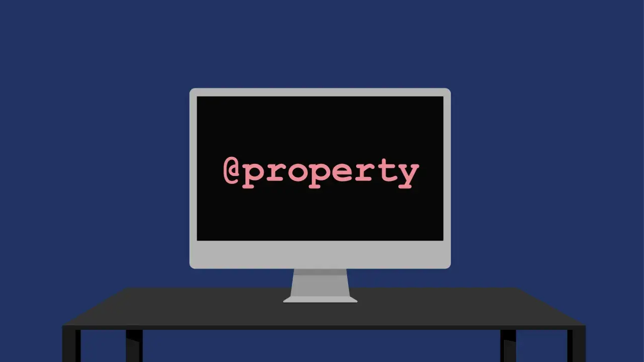 Ein Monitor zeigt "@property" in Python.