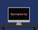 Ein Monitor zeigt "@property" in Python.