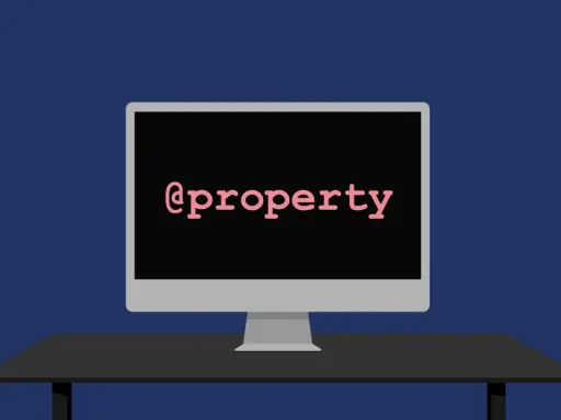 Ein Monitor zeigt "@property" in Python.