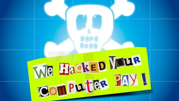 Bedrohlicher Totenkopf über einer Nachricht aus Zeitungsausschnitten: "We Hacked Your Computer PAY!". Ein klares Zeichen für Malware und Ransomware.